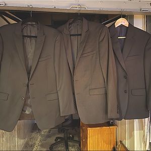 3 Calvin Klein men’s suits 42R 34x30 One Charcoal, and two variations on black.
